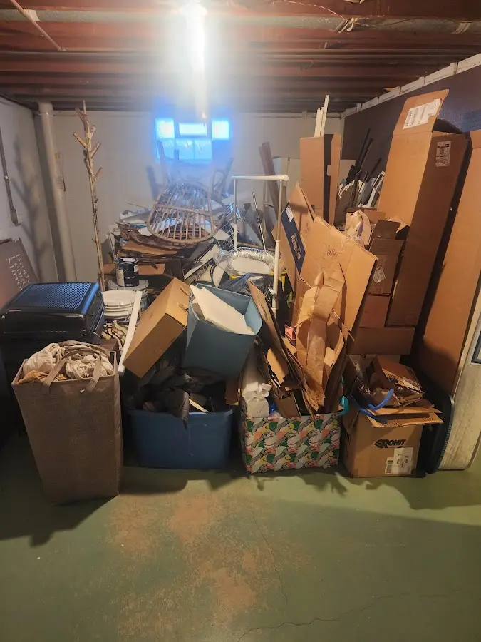 Roll-off dumpster container at job site for 15 Yard Dumpster Rental in Riva